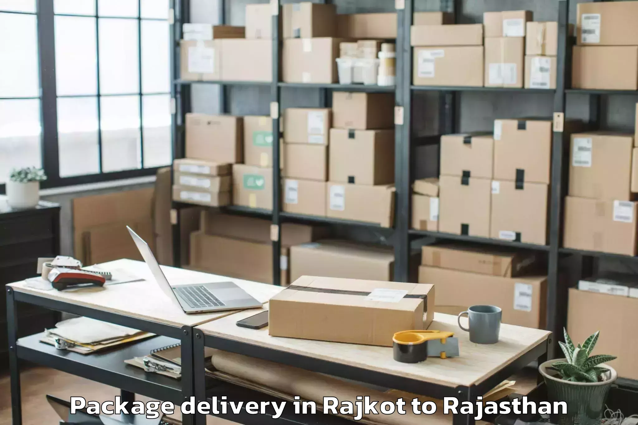 Easy Rajkot to Chauth Ka Barwara Package Delivery Booking